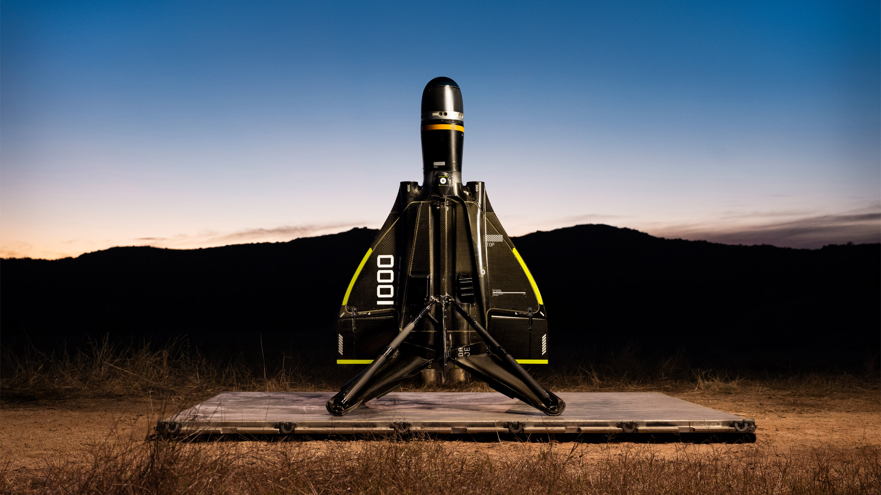 the Roadrunner drone on a launchpad at twilight